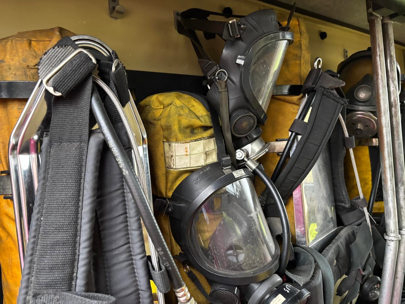 Period breathing apparatus and firefighting kit stowed inside the fire engine