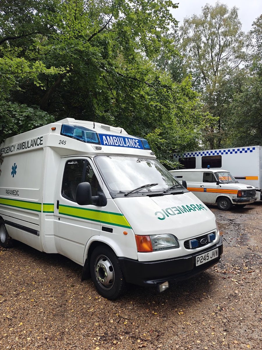 Side profile of the classic Ford Transit emergency ambulance in period NHS livery