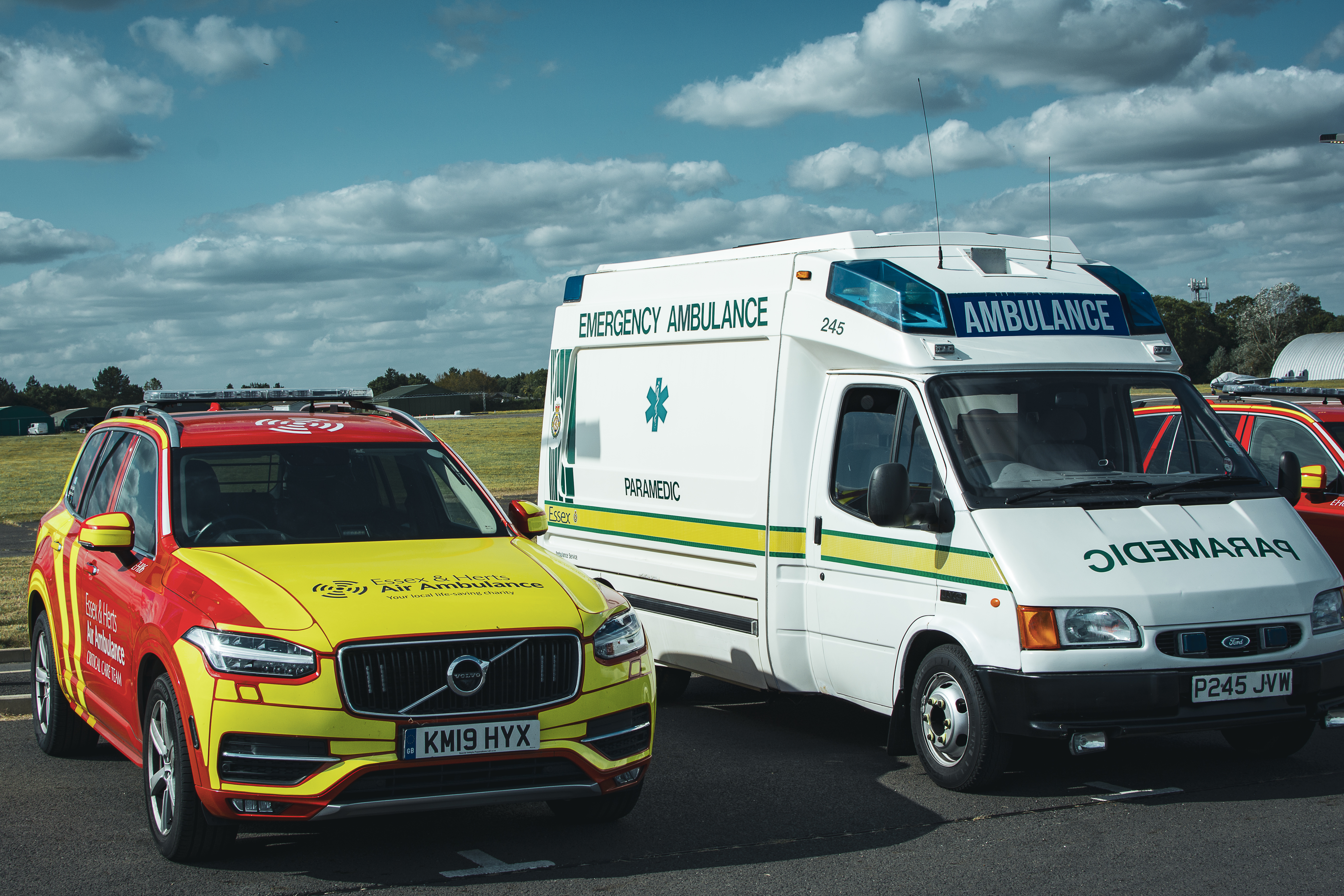 Classic emergency ambulance alongside a modern air ambulance response vehicle