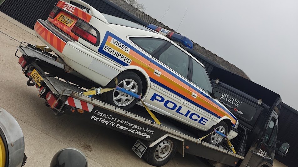 Rover 820 Video Equipped police car loaded on the Klassic Garage recovery truck for film and TV hire