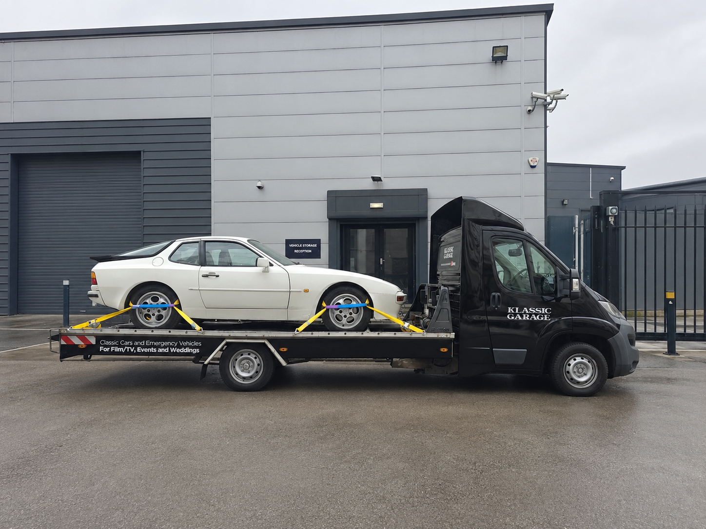 Klassic Garage vehicle storage facility exterior in Cambridge, with a Porsche 944 arriving by transporter